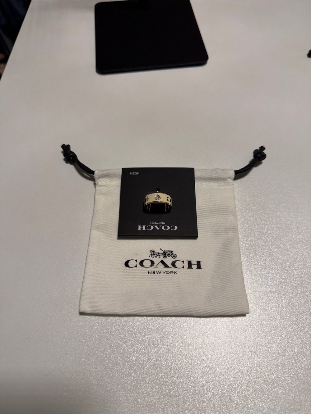 Coach Gold-Tone Men's Ring with Black Stud Accents